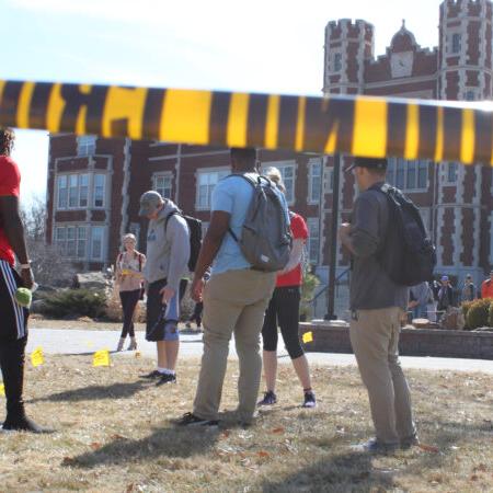 Students on campus doing a drill